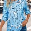 Sky Blue Button Graffiti Print Long Sleeve Blouse 1 Sky Blue Button Graffiti Print Long Sleeve Blouse -UrbanLayer Store 338589 P 16932041448870